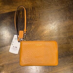 Coach Textured Orange Wristlet